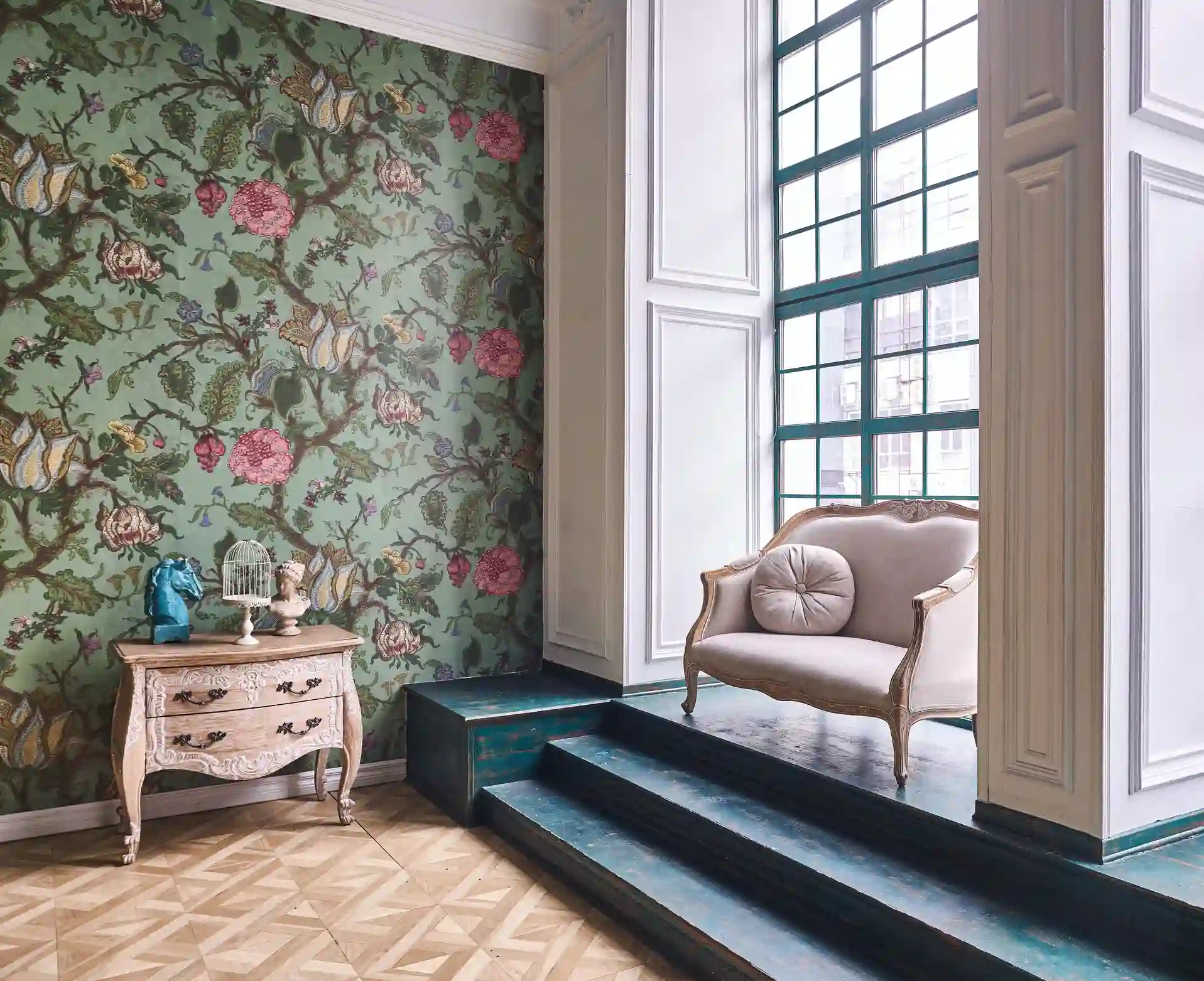 A pale floral wallpaper pattern covering a bright room wall